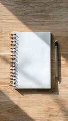 Open blank notebook with pen on wooden desk, education and planning concept, clean workspace top view, vertical 9:16 social media background