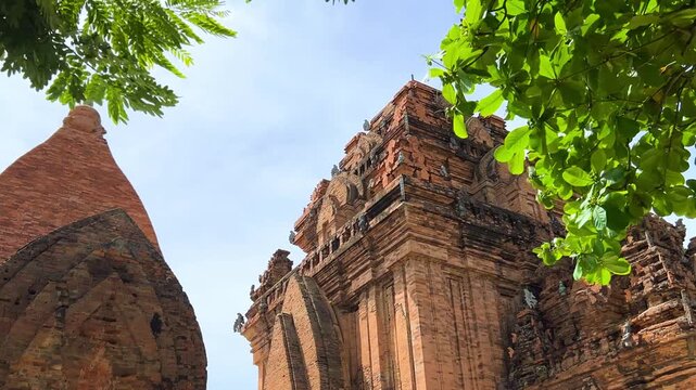Nha Trang, Vietnam - September 17, 2025: View of the Po Nagar Cham Tower Complex, dedicated to Hindu and Buddhist deities. Close-up of the ancient temple towers. Legacy of the Champa civilization.	