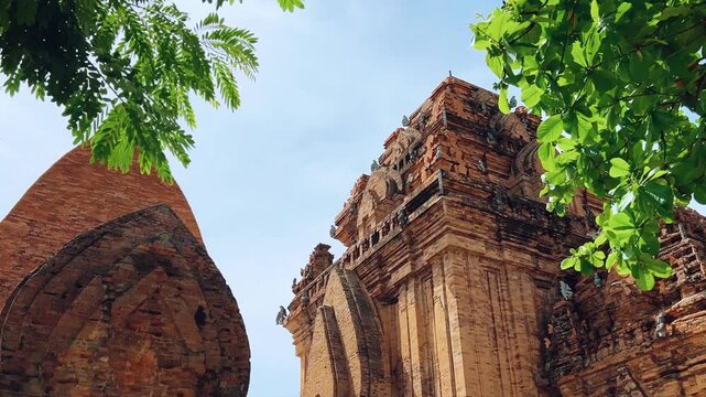 Nha Trang, Vietnam - September 17, 2025: View of the Po Nagar Cham Tower Complex, dedicated to Hindu and Buddhist deities. Close-up of the ancient temple towers. Legacy of the Champa civilization.	
