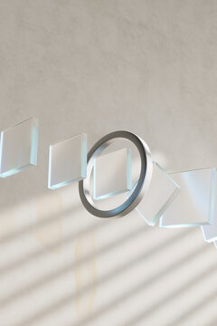 3D render of glass tiles and steel ring in staggered composition