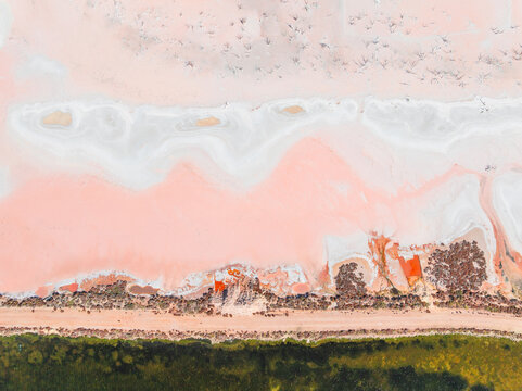 Colorful abstract details along the shoreline of a salt lake