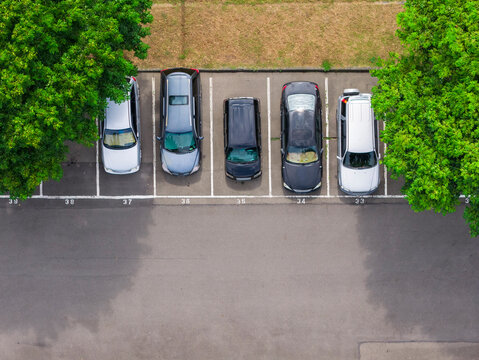 Aerial View of Cars in Labeled Parking Lot