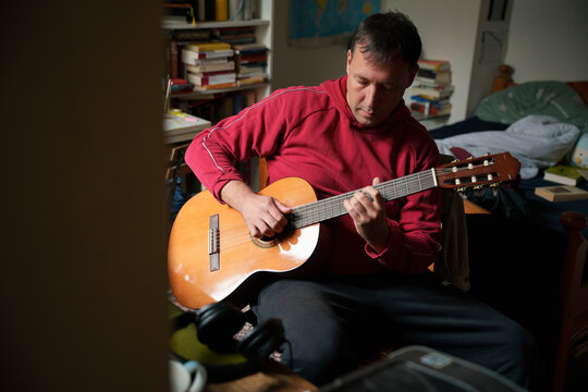 Man Playing Acoustic Guitar