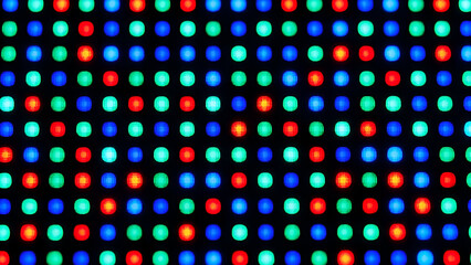 Abstract pattern of colorful LED lights creating a technological background