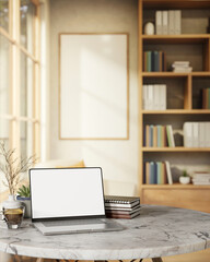 White screen laptop and coffee on round marble table across bookshelf in a living room with sunlight