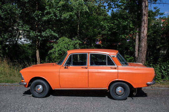 An old classic car on the road