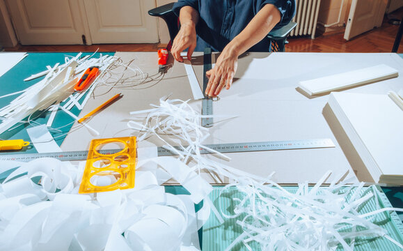 Cutting paper.