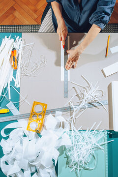 Cutting paper.