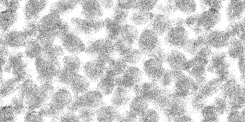 Dense seamless texture background of overlapping human fingerprints in grunge black and white style