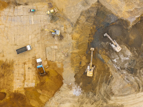 Aerial View of Construction Site with Heavy Machinery