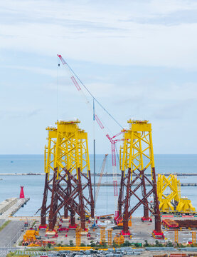 Offshore Wind Turbine Foundations at Coastal Construction Yard