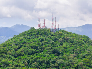 Telecommunication Towers on Forested Mountain Summit