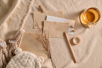 Amelia baby name announcement with cozy accessories