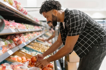 Black Man Selecting Vegetable in the Groceries Shop