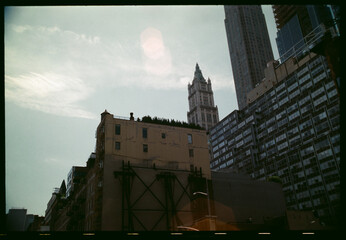 New York Skyline With Historic and Modern Buildings Under Cloudy Sky