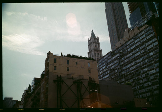 New York Skyline With Historic and Modern Buildings Under Cloudy Sky
