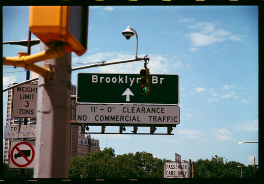 Brooklyn Bridge Traffic Sign Under Clear Blue Sky