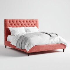 Obraz premium Luxurious tufted upholstered bed frame in a vibrant coral hue with crisp white bedding