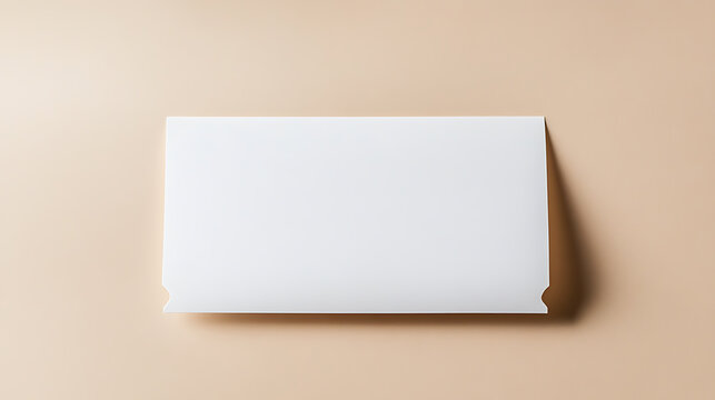 Minimalist flat lay of a blank white card or envelope on a plain beige background, perfect for design mockups, invitations, or product showcases. Simple elegance.