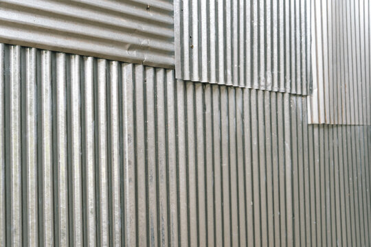 Industrial rusty background old grunge rusty zinc wall for textured background old rusty galvanized rust and scratched steel texture corrugated iron siding vintage background