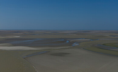 View of the bay floor during low tide.