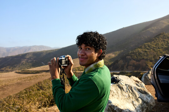 Man takes landscape photos