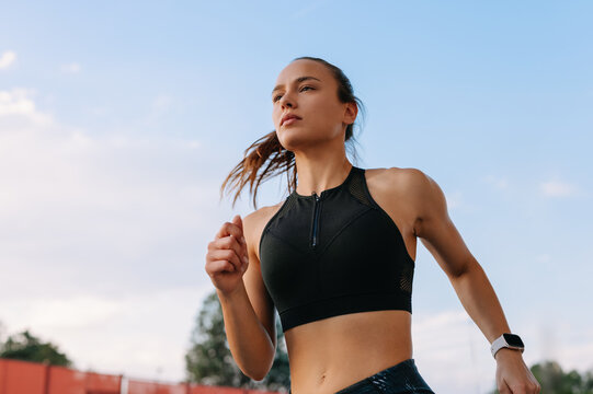 Woman running in the city