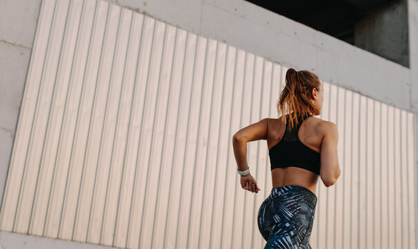 Woman running in the city