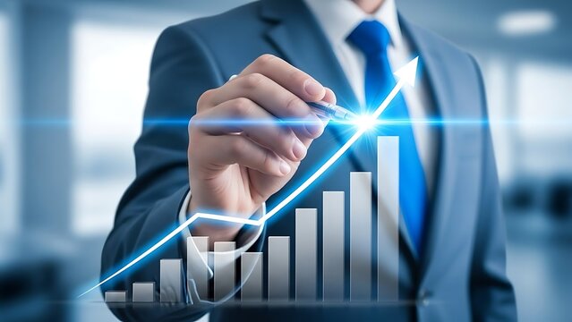 Businessman draws upward trend line on a bar graph with a pen tool
