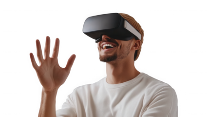 A man wearing a vr headset with his hand raised and a happy expression on a black isolated background on transparent background
