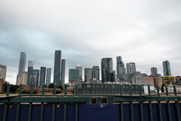 Canary wharf cityscape featuring modern skyscrapers against an overcast sky