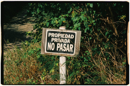 Analog image of a small sign warning that this is private property