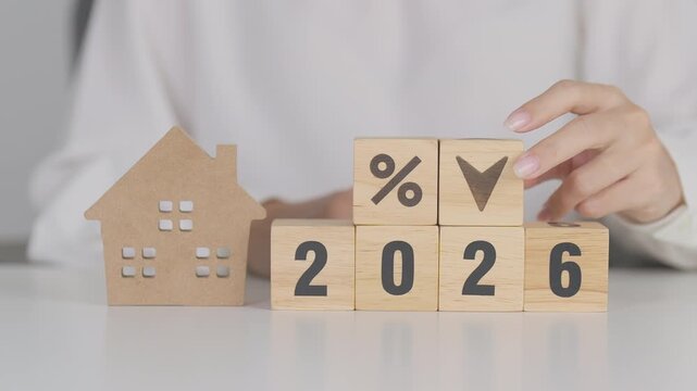 2026 New Year with percentage change to UP and Down arrow with Home model. Real estate Mortgage, Refinance, House loan and debt, Interest rate, Insurance, Financial and Property Tax