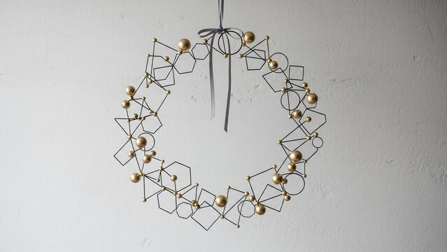 Geometric christmas wreath modern holiday decor gold ornament diy craft unique wall hanging decoration idea