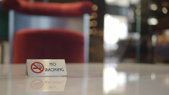 Sign indicates no smoking policy in public space