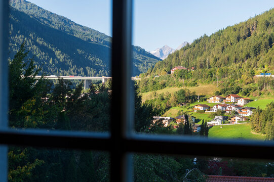 Alpine Village Landscape Seen Through a Window Pane