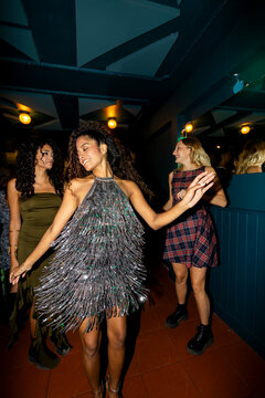Woman dancing in fancy party