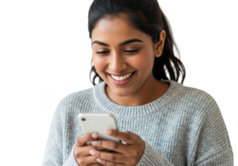Young woman smiling while looking at her phone, isolated on transparent background