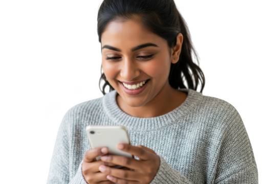 Young woman smiling while looking at her phone, isolated on transparent background