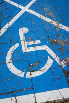 White symbol on a blue background on the floor