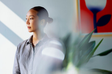 Portrait of a Contemplative Woman In Soft Light 