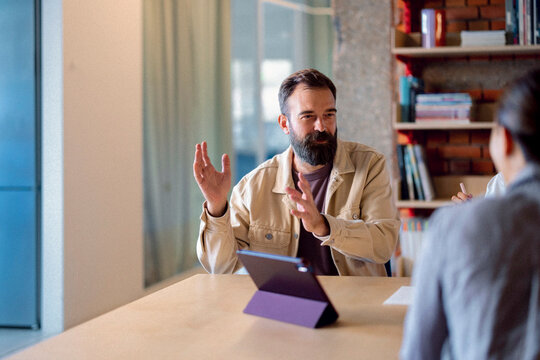 Business Meeting Between Colleagues In A Modern Office