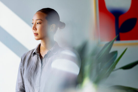 Portrait of a Contemplative Woman In Soft Light 