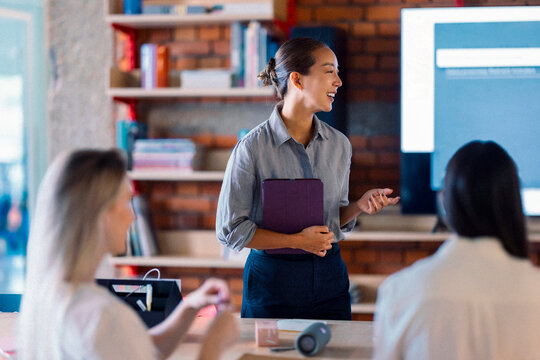 Confident Presenter Leads Professional Workshop