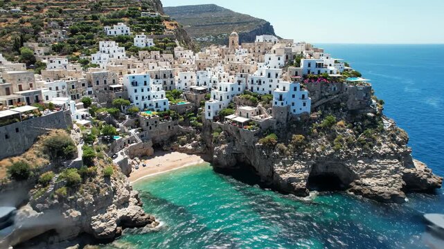 Aerial view of a traditional white village built on a steep cliff overlooking the turquoise sea in greece vector illustration