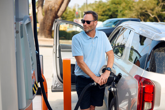 Man filling the car with fuel