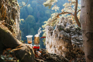 brewing coffee in the morning in the mountains