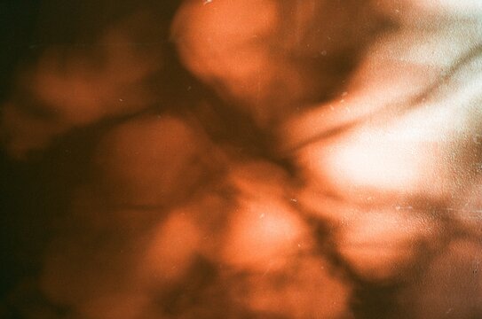 Soft orange light and abstract film texture