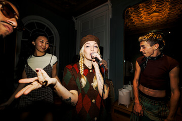 Woman singing live music performance at party event