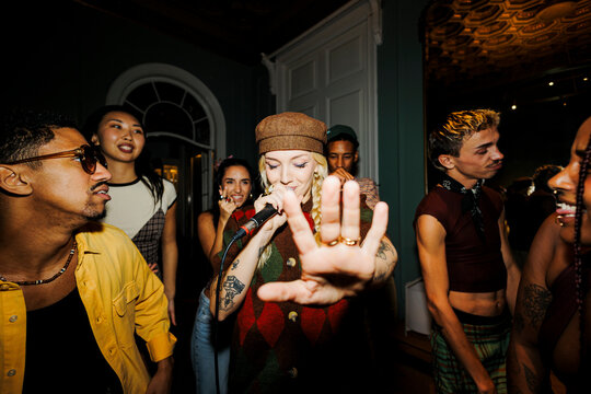 Woman singing live music performance at party event